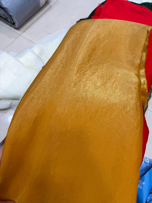 Plain Fendy Fabric – Golden Color | Lightweight Shimmer Material | ₹150 per Meter