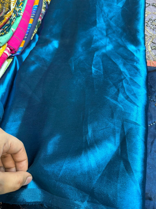 German Silk Fabric – Peacock Blue | Rich Gloss Finish | Easy Stitching | ₹120 per Meter
