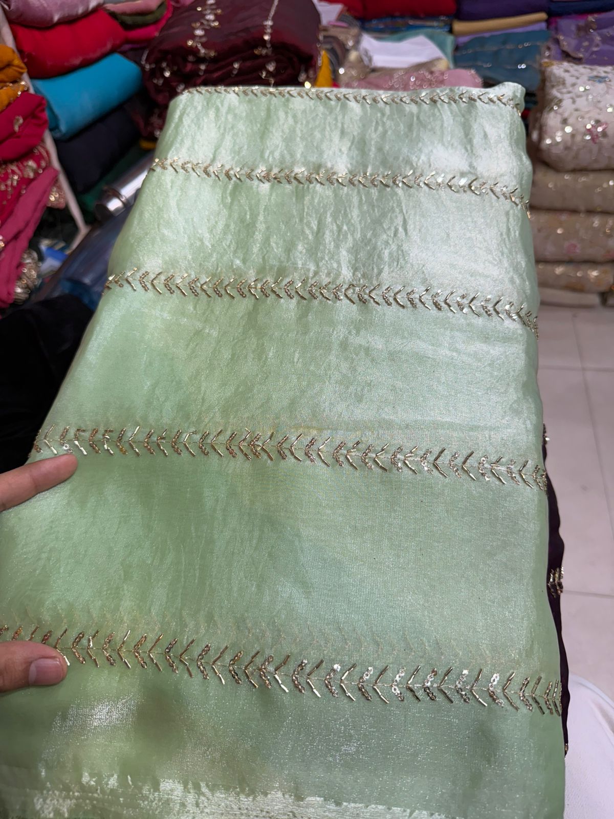 Pista Green Fancy Fendy Fabric with Linear Embroidery – Elegant Wear